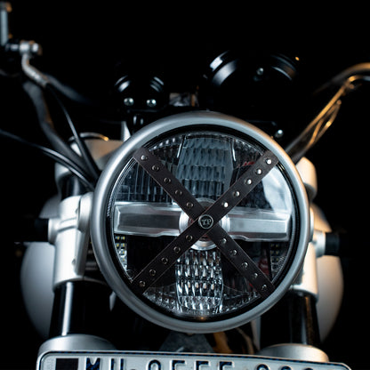 Studded Headlight Cross