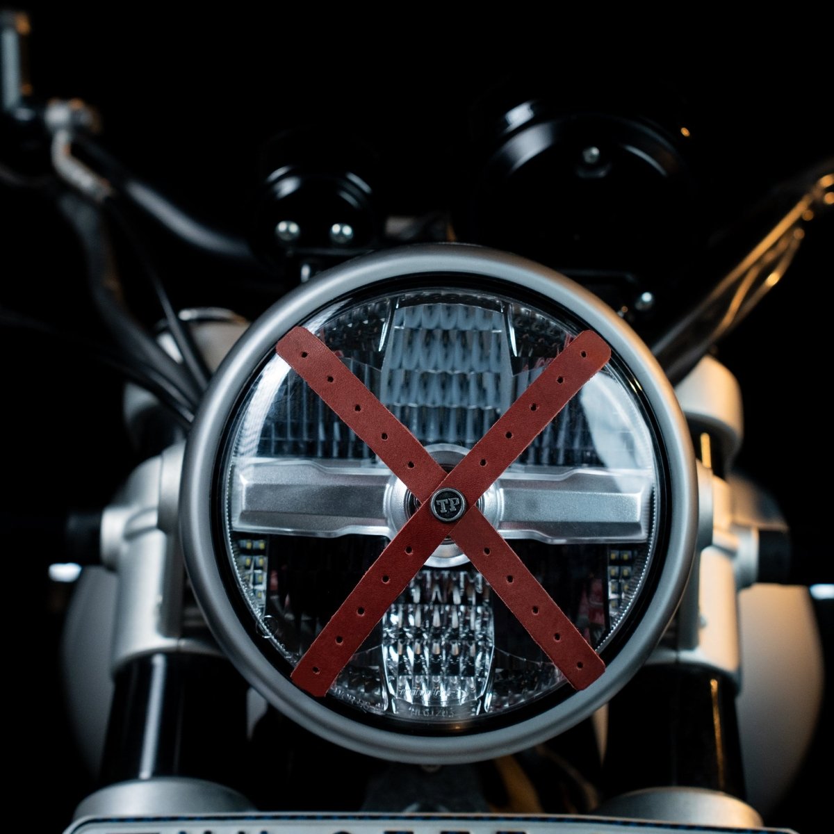 Perforated Headlight Cross - Tanners Pride (V.C. Exports)